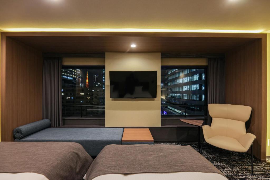 Postel nebo postele na pokoji v ubytování Bayside Hotel Azur Takeshiba