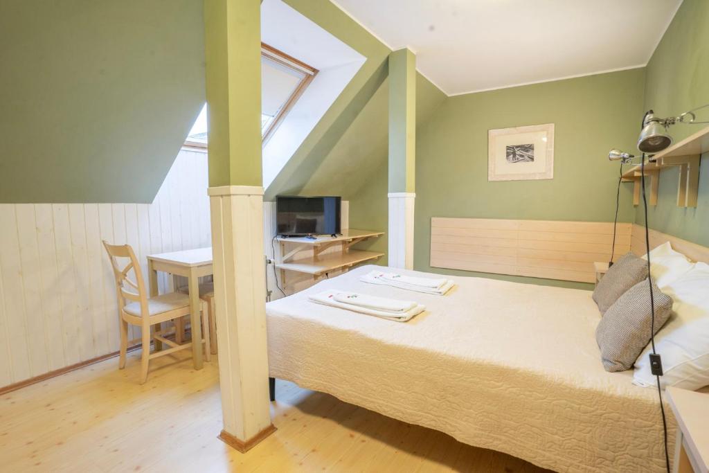 Postel nebo postele na pokoji v ubytování Kongo Hotel