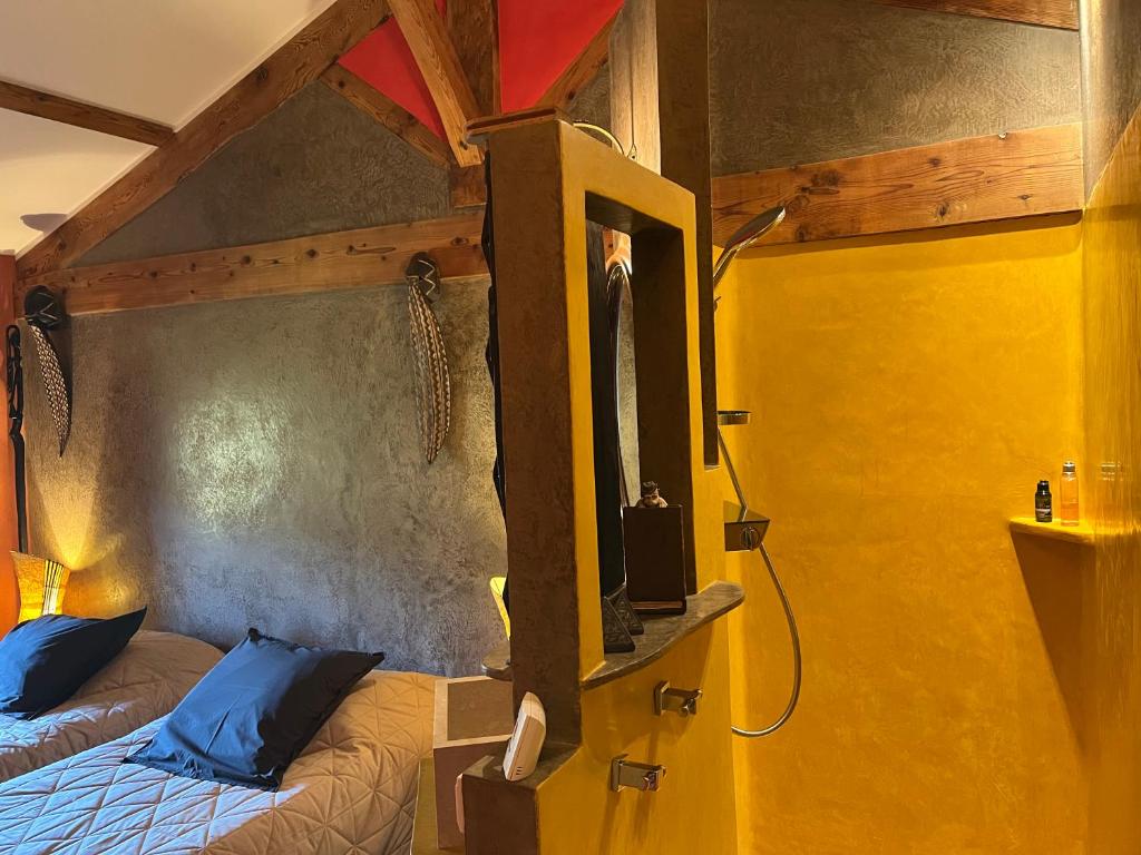 Postel nebo postele na pokoji v ubytování Domaine de Pipangaille