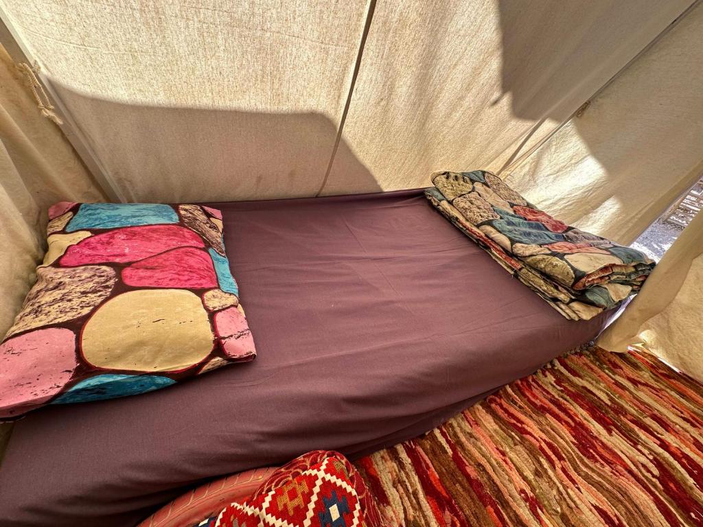 Postel nebo postele na pokoji v ubytování Muhra Camp Siwa