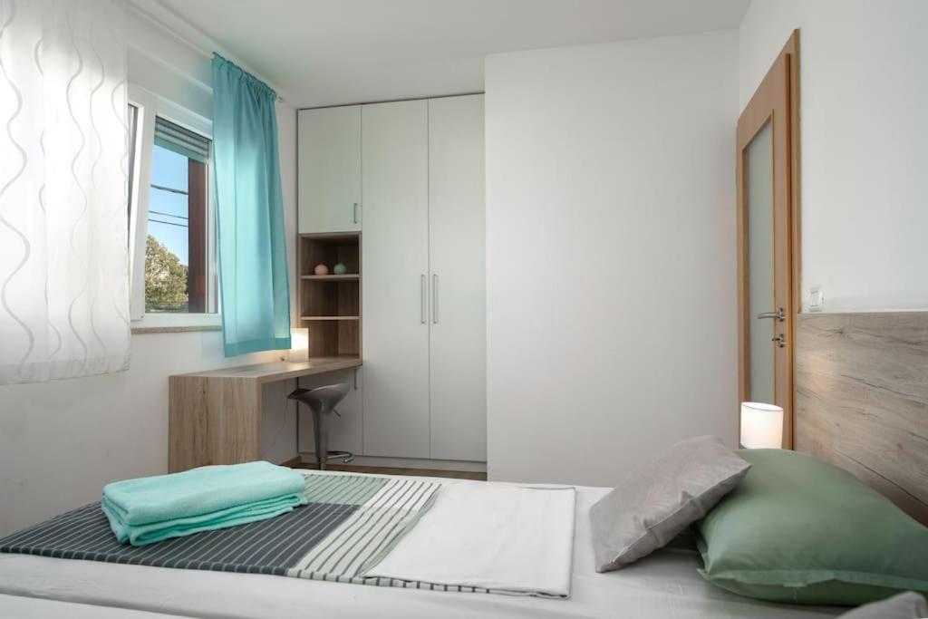 Postel nebo postele na pokoji v ubytování Villa Blue Valica