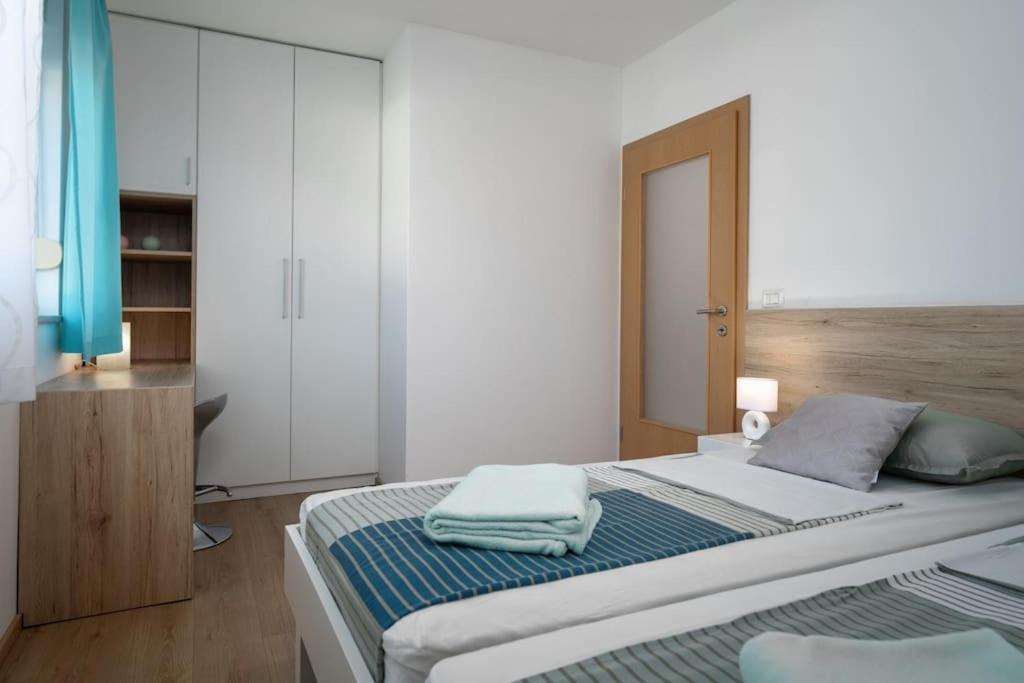 Postel nebo postele na pokoji v ubytování Villa Blue Valica