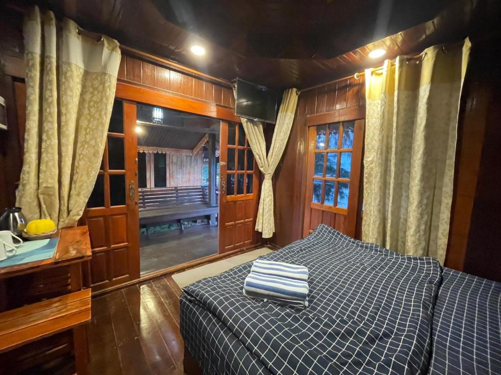 Postel nebo postele na pokoji v ubytování Wangsarai Resort