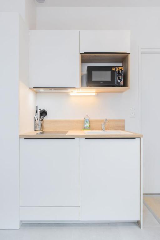 Dapur atau dapur kecil di Lille Saint-Michel Fully-equipped studio
