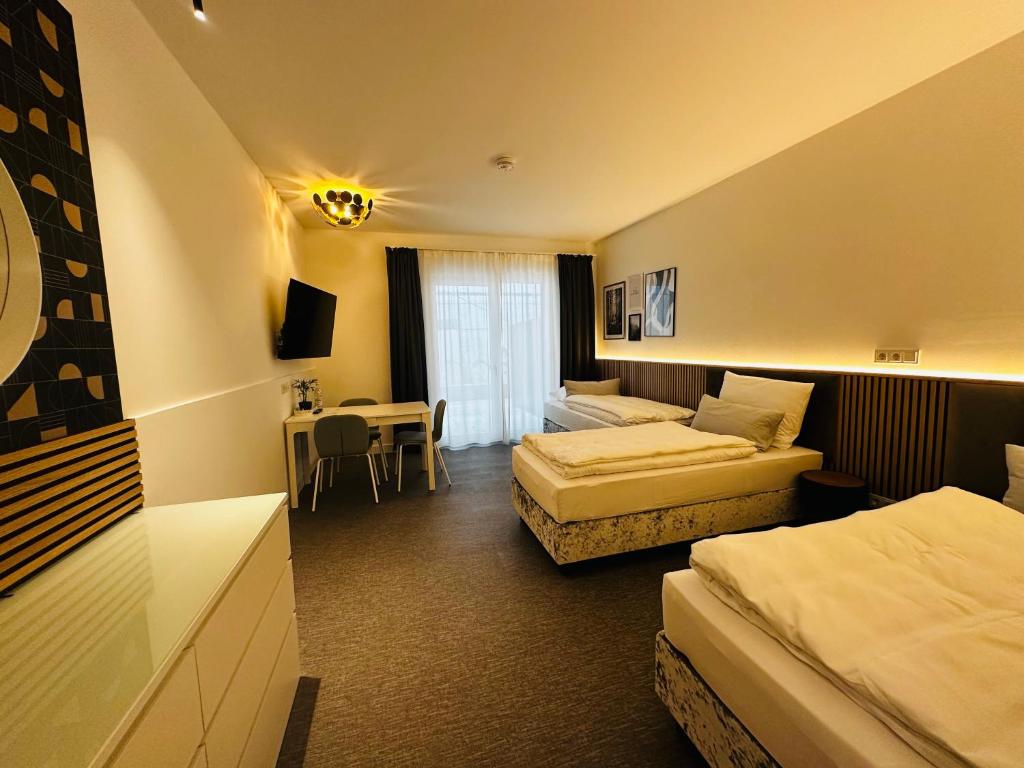 Postel nebo postele na pokoji v ubytování Boutique Hotel GreenLeaf