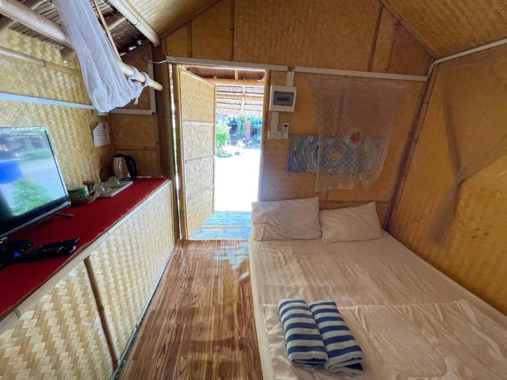 Postel nebo postele na pokoji v ubytování Wangsarai Resort