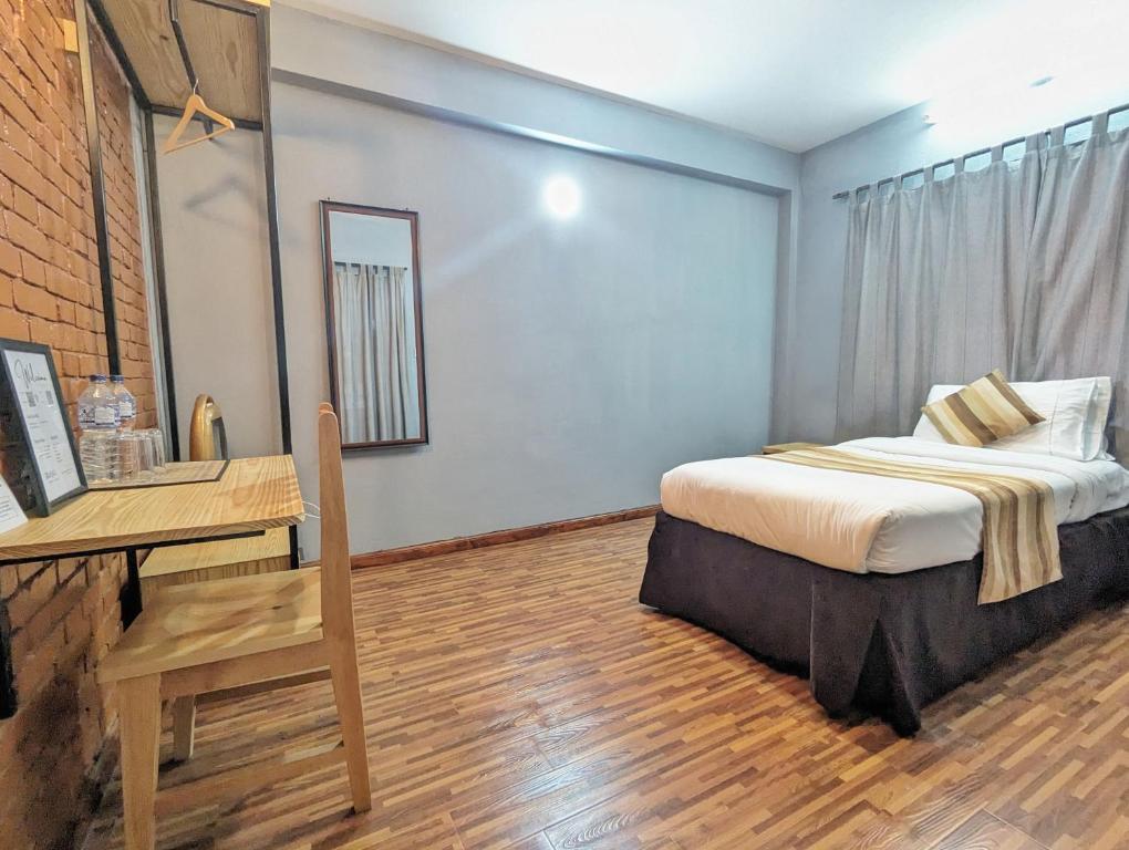Postel nebo postele na pokoji v ubytování Nyadha House Bed & Breakfast