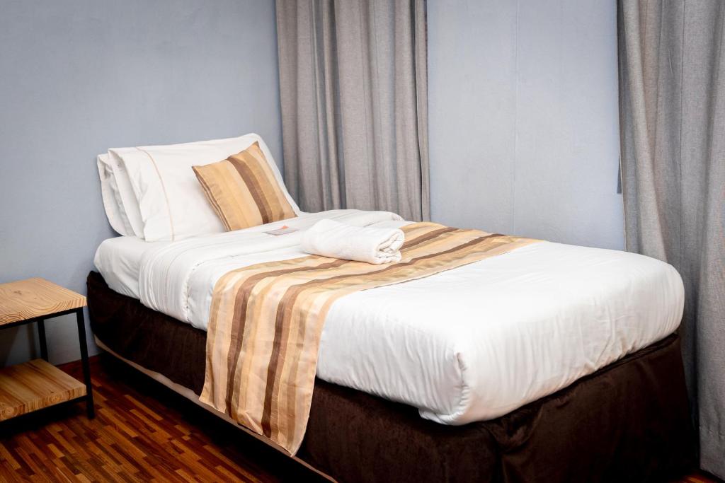 Postel nebo postele na pokoji v ubytování Nyadha House Bed & Breakfast