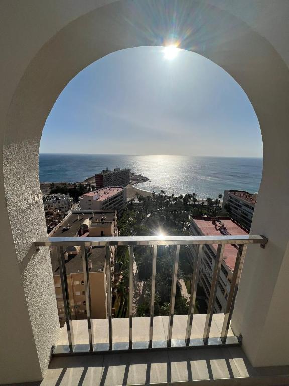 a view of the ocean from a balcony at Luxury Penthouse Playas de torrevieja 6pax in Torrevieja