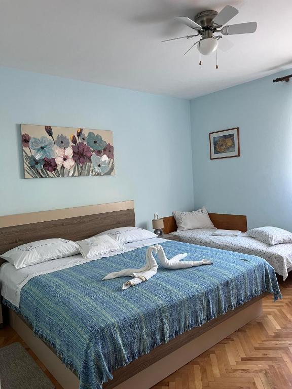 Postel nebo postele na pokoji v ubytování Apartment Ciba