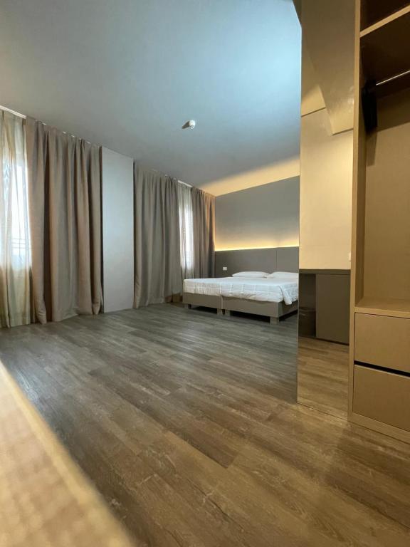 Postel nebo postele na pokoji v ubytování Hotel Albatros