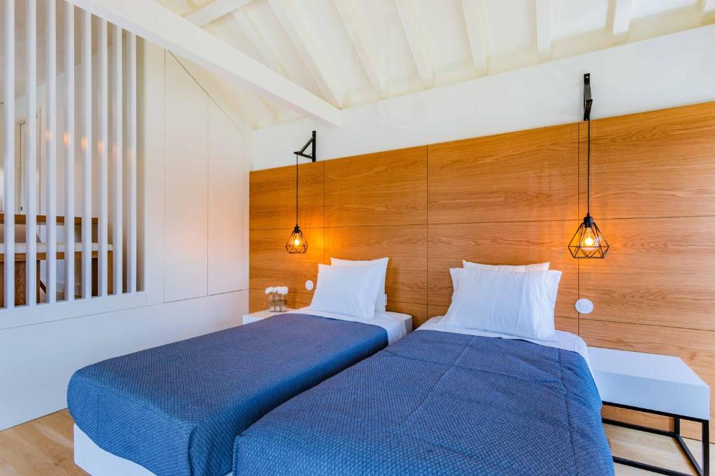Postel nebo postele na pokoji v ubytování Porto Apartments - Sé