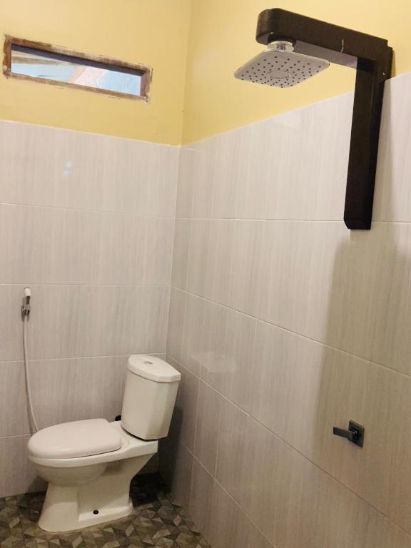 Koupelna v ubytování R5 Keramba Inn