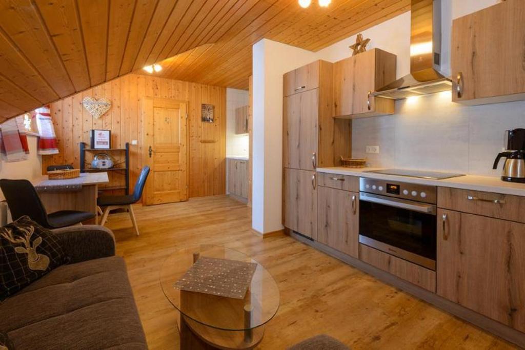 Kuchyň nebo kuchyňský kout v ubytování Almerhof - Waldferienhof Almer