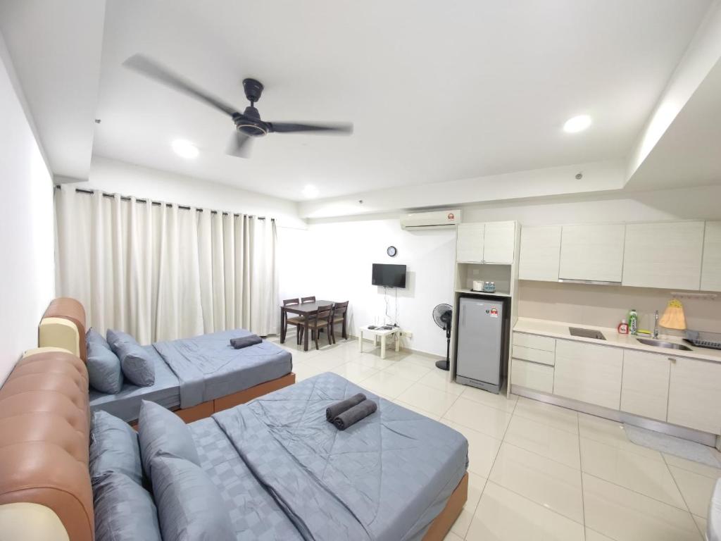Kuchyň nebo kuchyňský kout v ubytování Wan's Homestay i-City