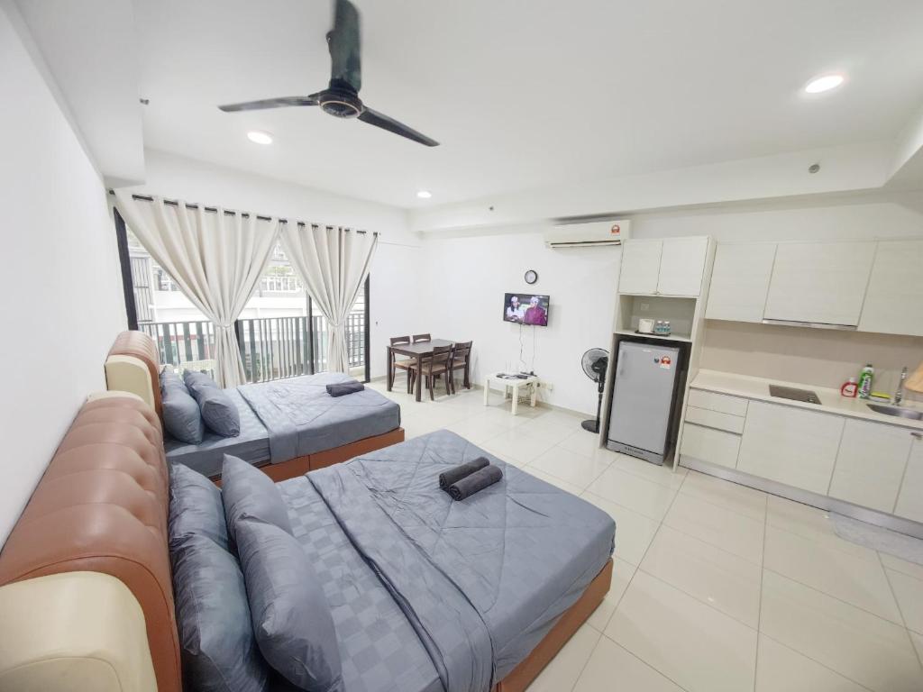 Kuchyň nebo kuchyňský kout v ubytování Wan's Homestay i-City
