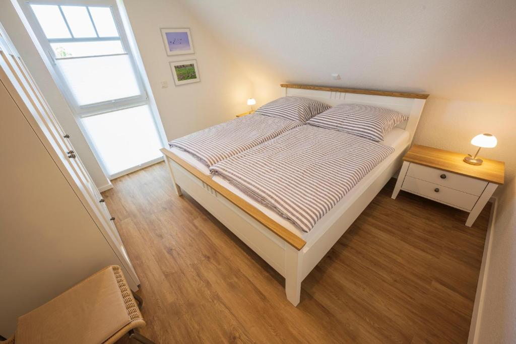 Postel nebo postele na pokoji v ubytování Wattperle