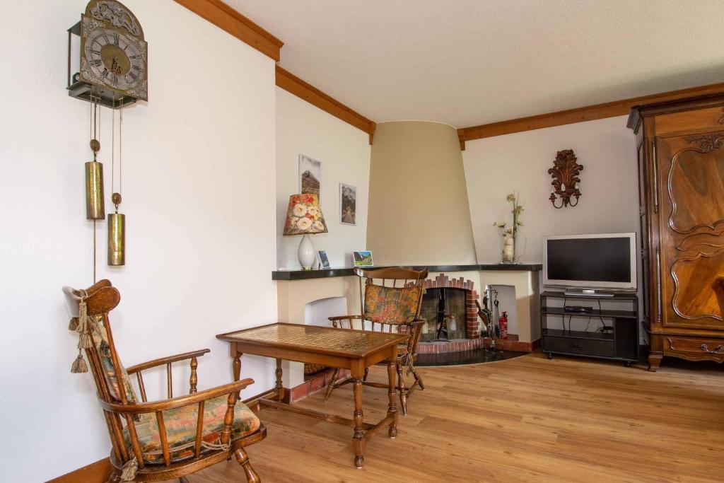 TV a/nebo společenská místnost v ubytování Chalet Grimm