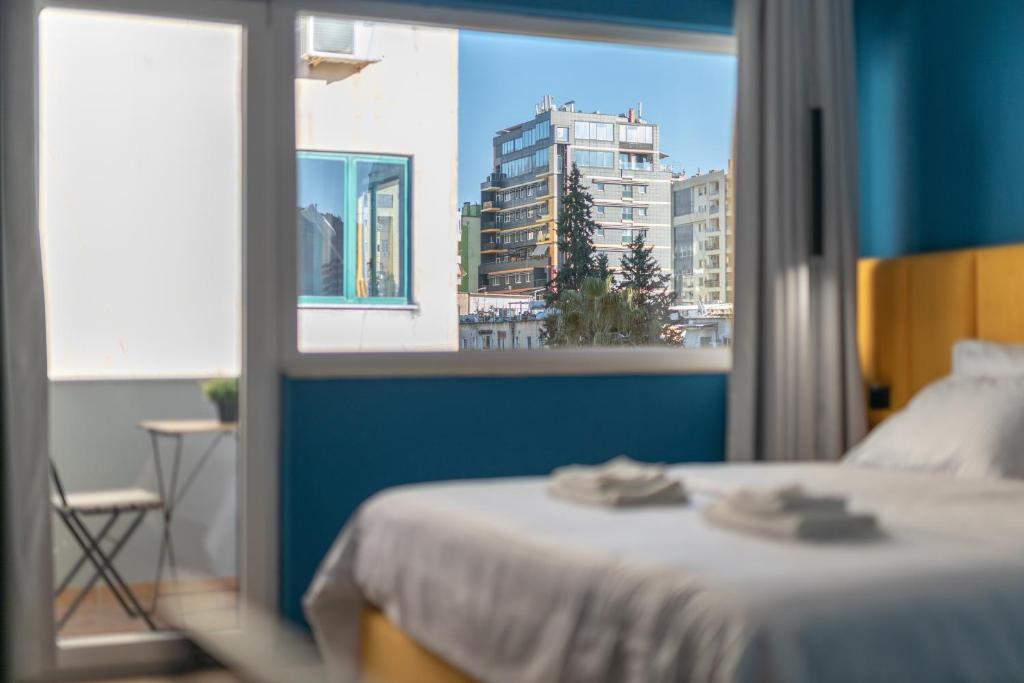 Postel nebo postele na pokoji v ubytování Urban Block Tirana