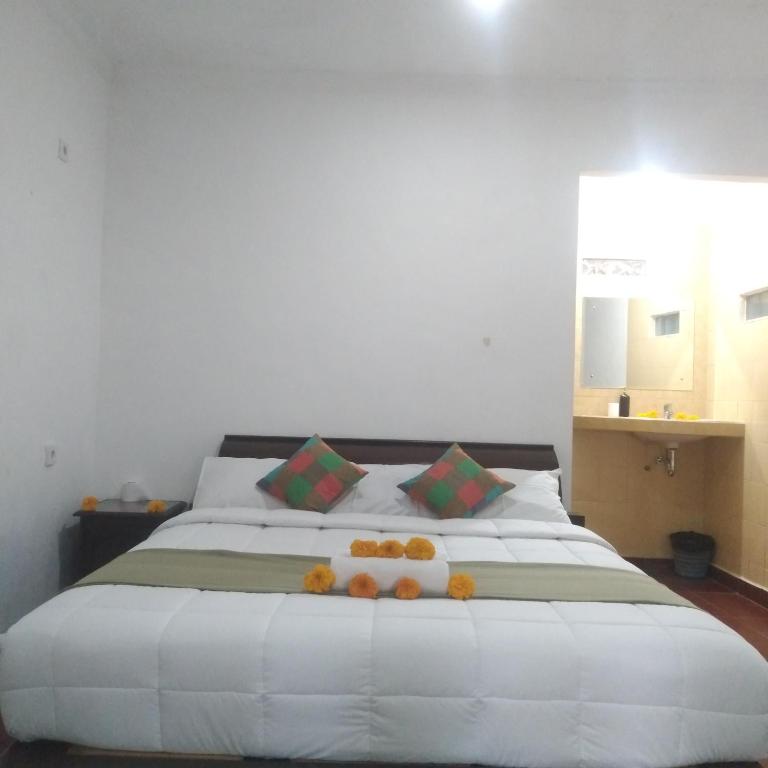 Postel nebo postele na pokoji v ubytování Inn Between