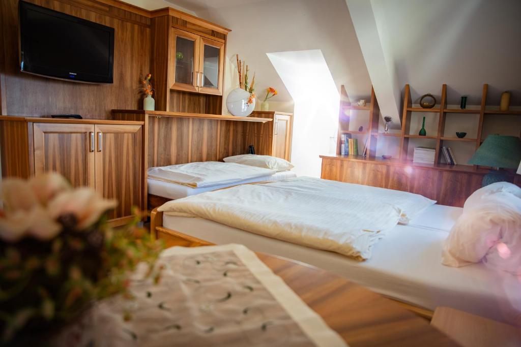 Postel nebo postele na pokoji v ubytování Landgasthof Winter
