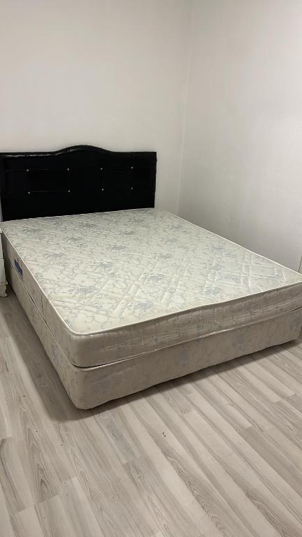 a mattress sitting on the floor in a room at Black in Köseilyas