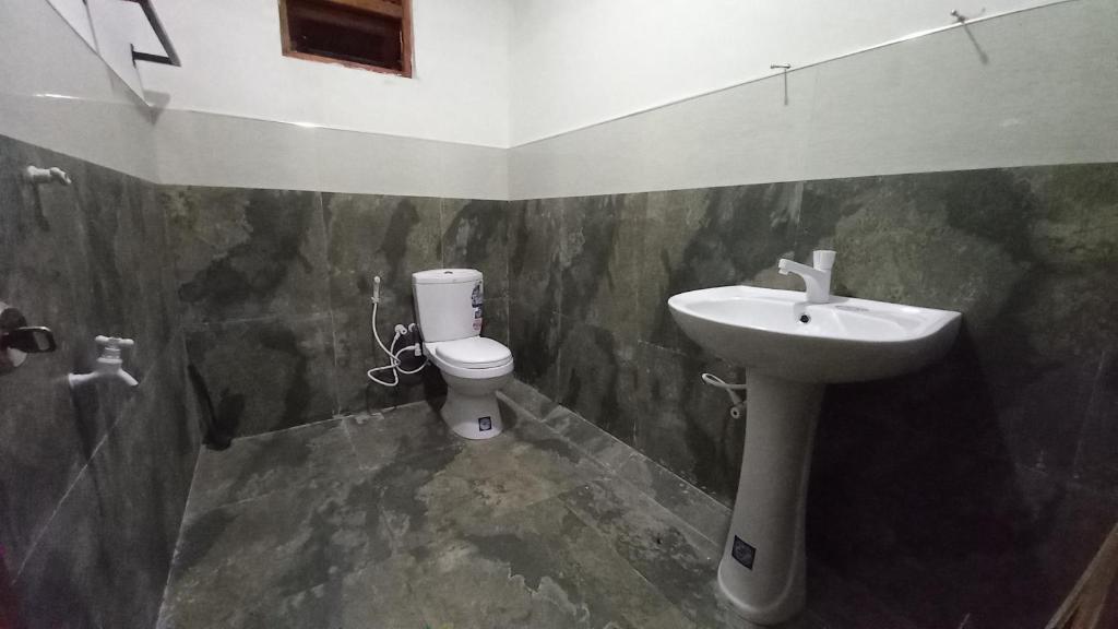 Koupelna v ubytování Sewana Guest INN