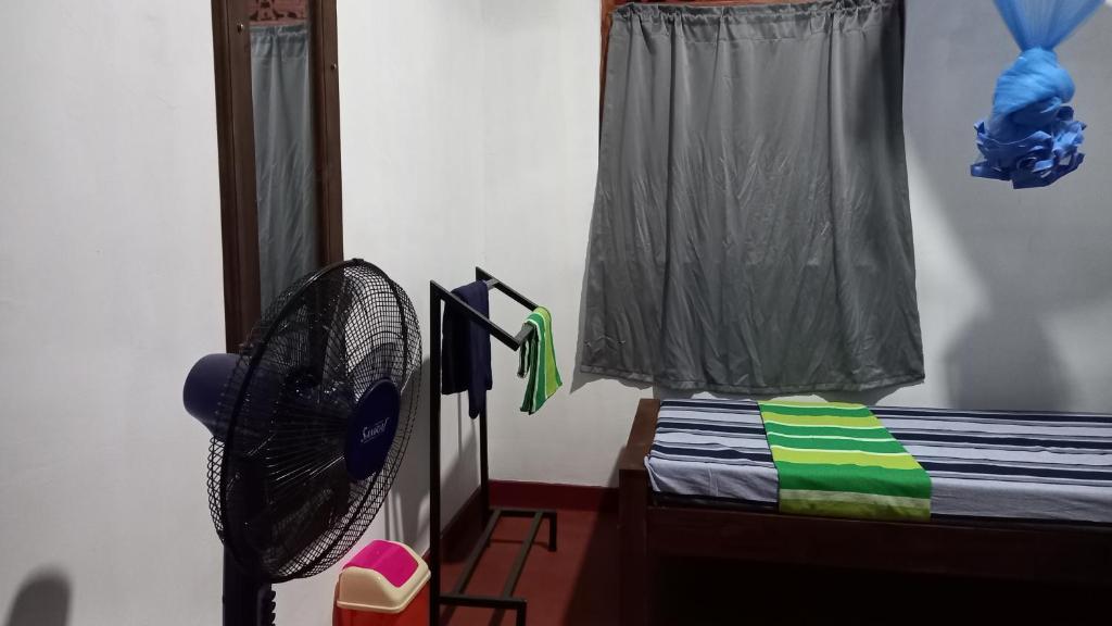 Postel nebo postele na pokoji v ubytování Sewana Guest INN
