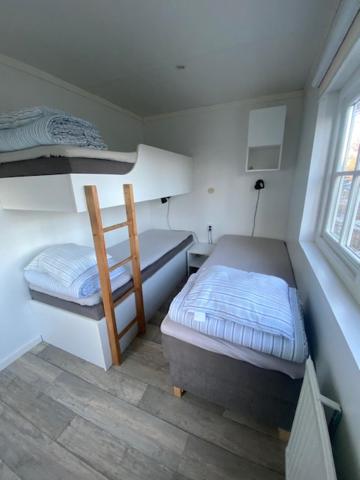 Postel nebo postele na pokoji v ubytování Ursand Resort & Camping