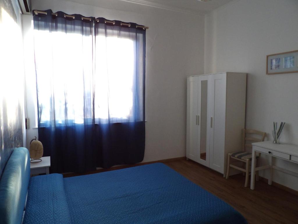 Postel nebo postele na pokoji v ubytování B&B Stella Marina