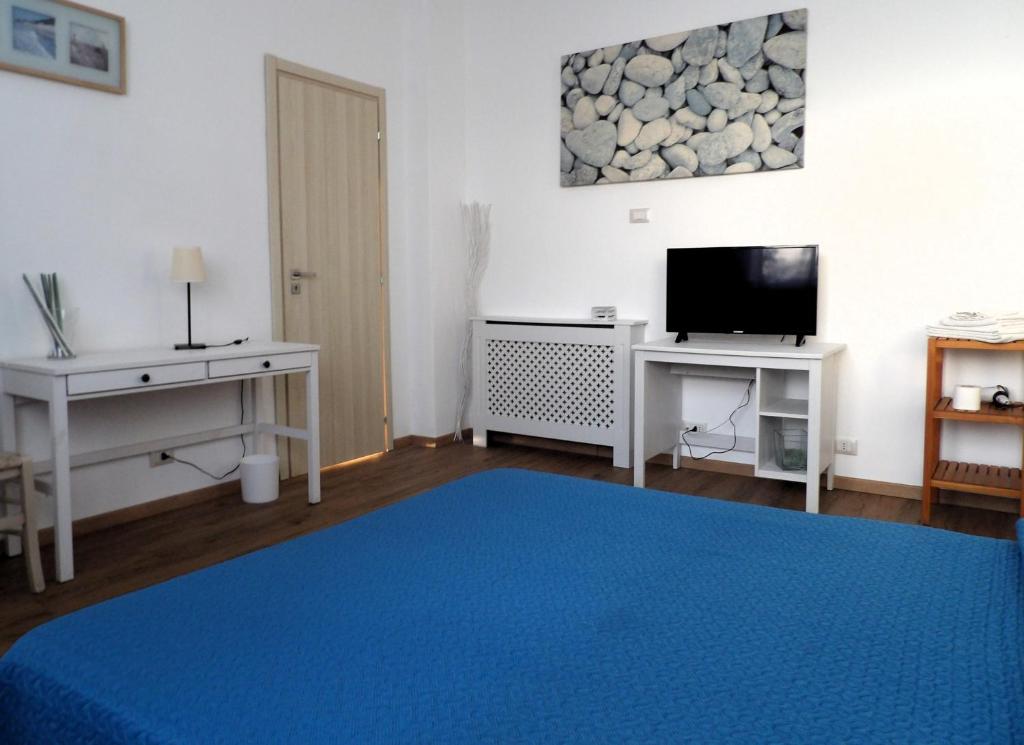 Postel nebo postele na pokoji v ubytování B&B Stella Marina