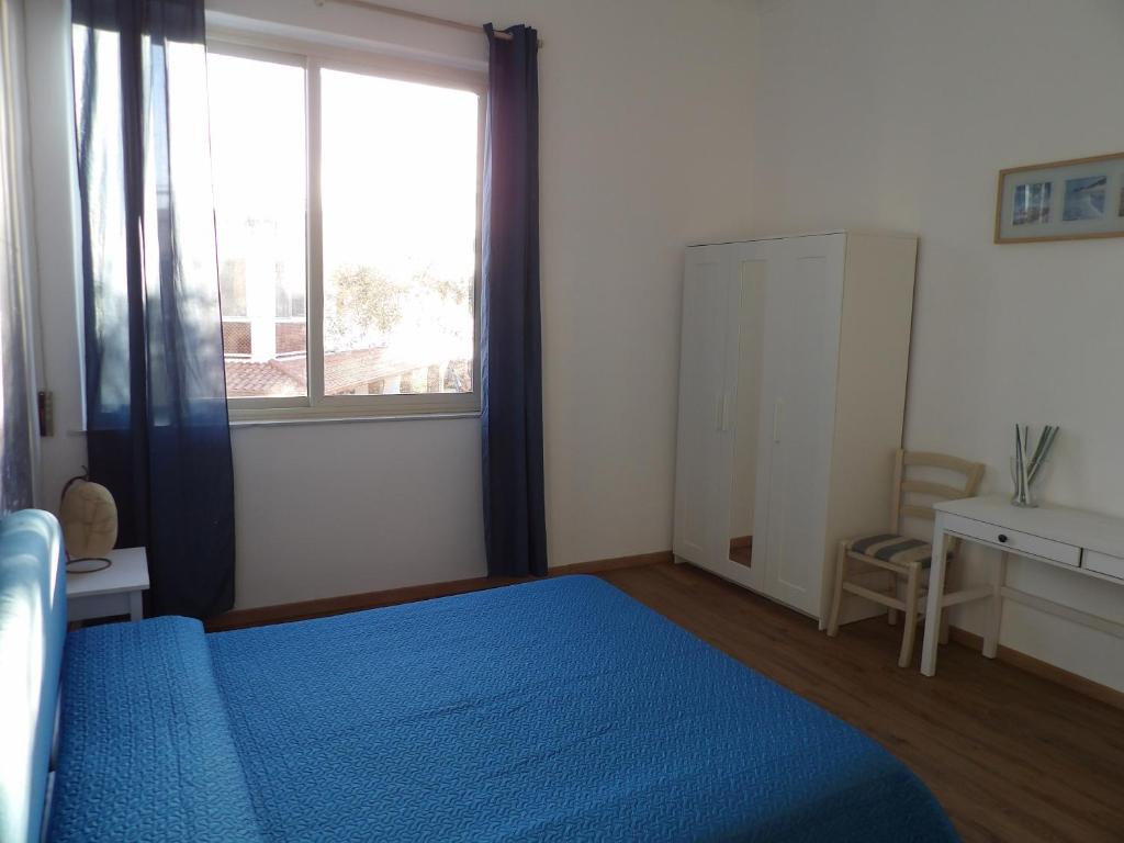 Postel nebo postele na pokoji v ubytování B&B Stella Marina