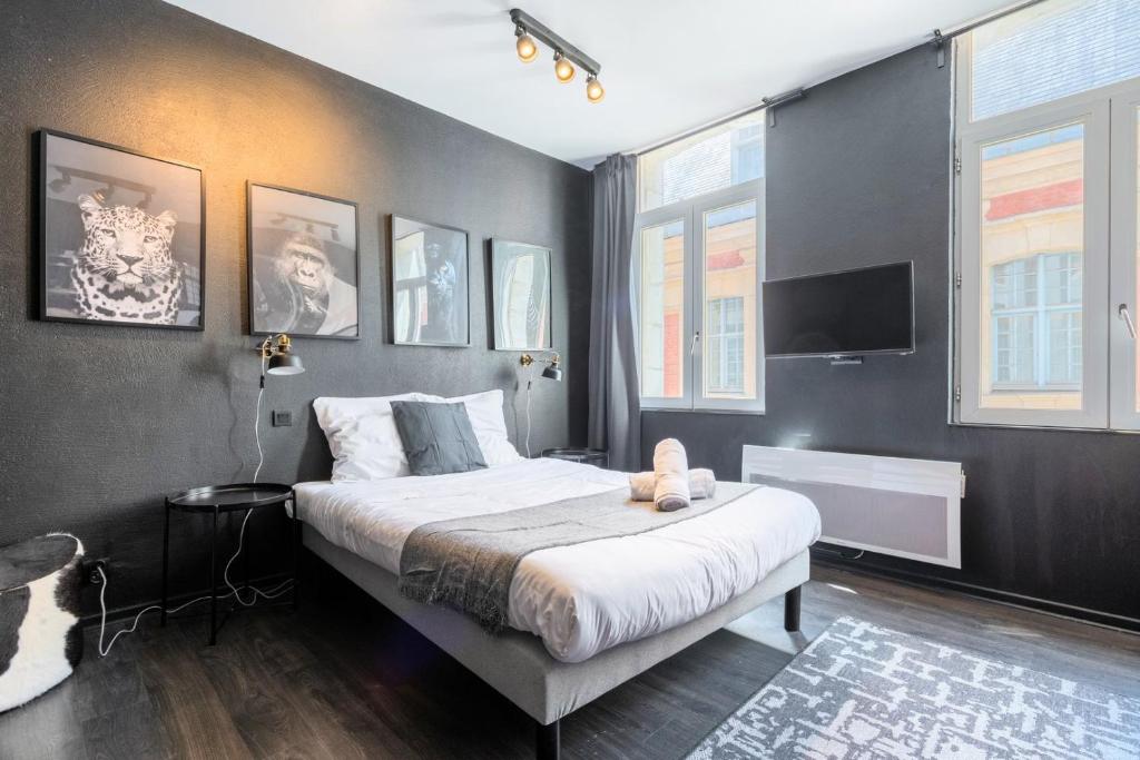 Ένα ή περισσότερα κρεβάτια σε δωμάτιο στο Studio located on the Grand Place!