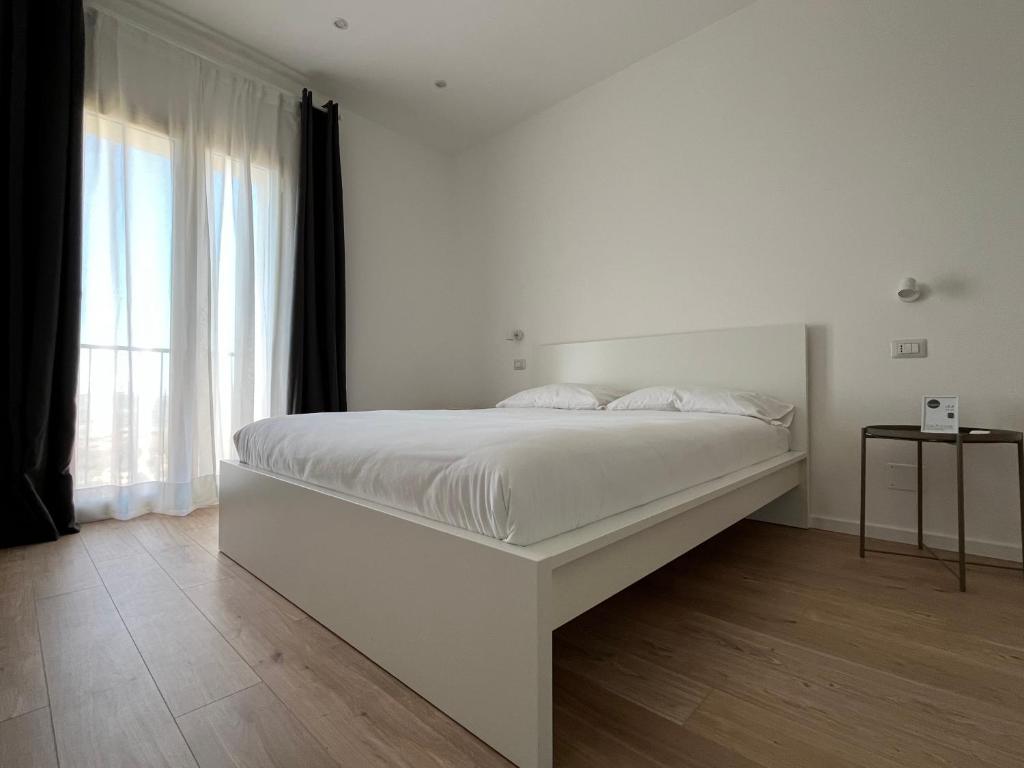 Postel nebo postele na pokoji v ubytování CASA20