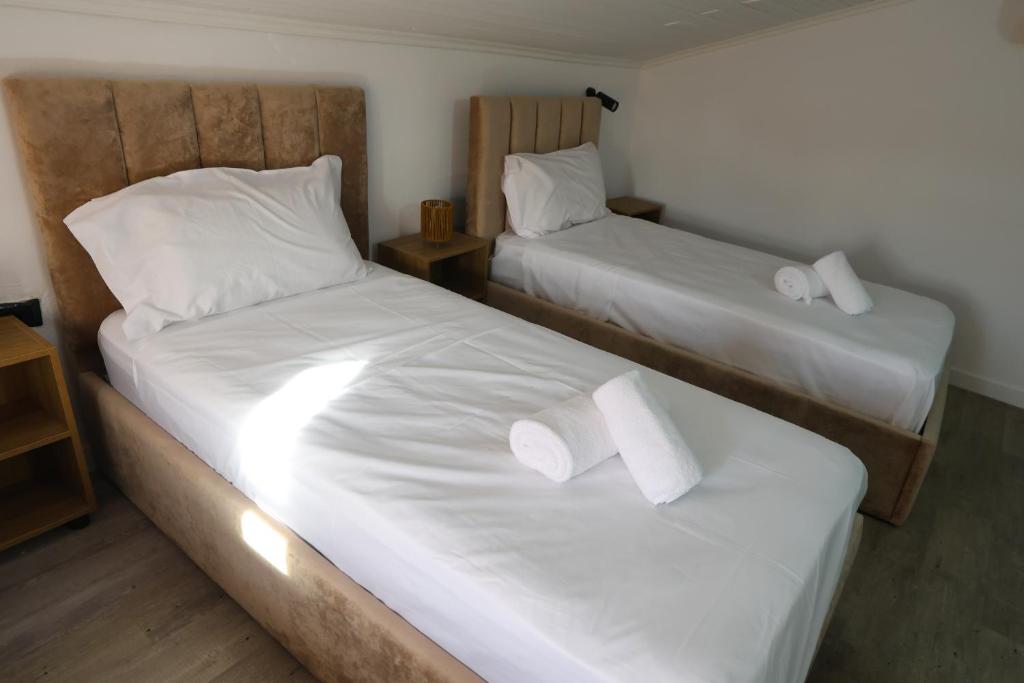 Postel nebo postele na pokoji v ubytování Vila Alizee Hotel