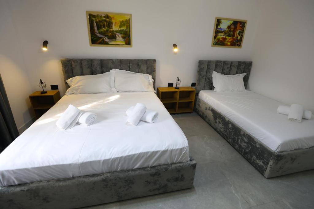 Postel nebo postele na pokoji v ubytování Vila Alizee Hotel