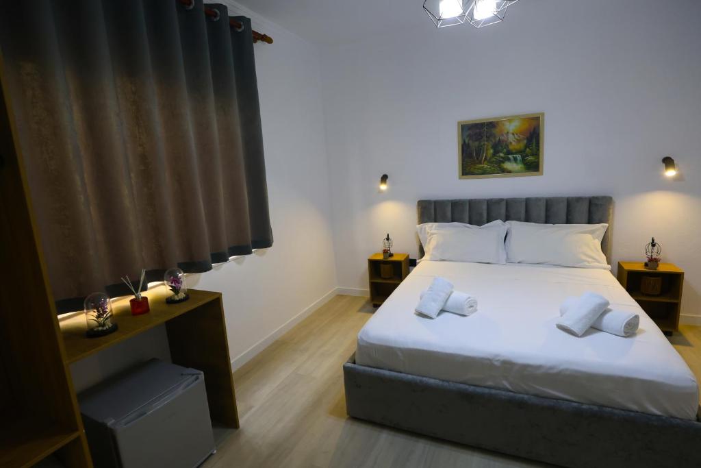 Postel nebo postele na pokoji v ubytování Vila Alizee Hotel
