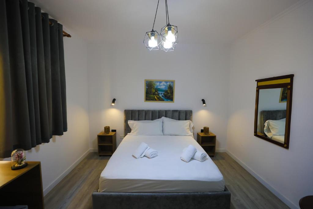 Postel nebo postele na pokoji v ubytování Vila Alizee Hotel