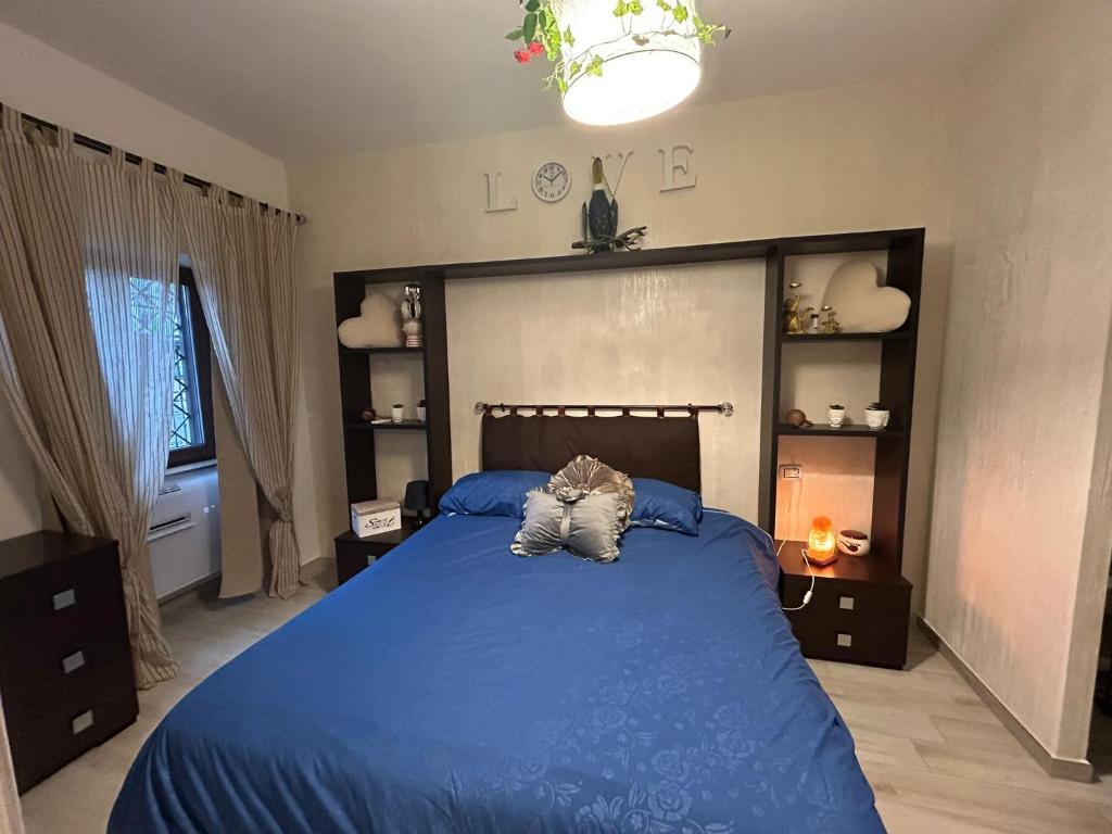 מיטה או מיטות בחדר ב-L'angolo Delle Stelle