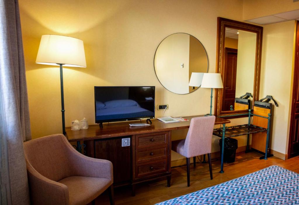 TV a/nebo společenská místnost v ubytování Hotel Spa Tudanca Aranda