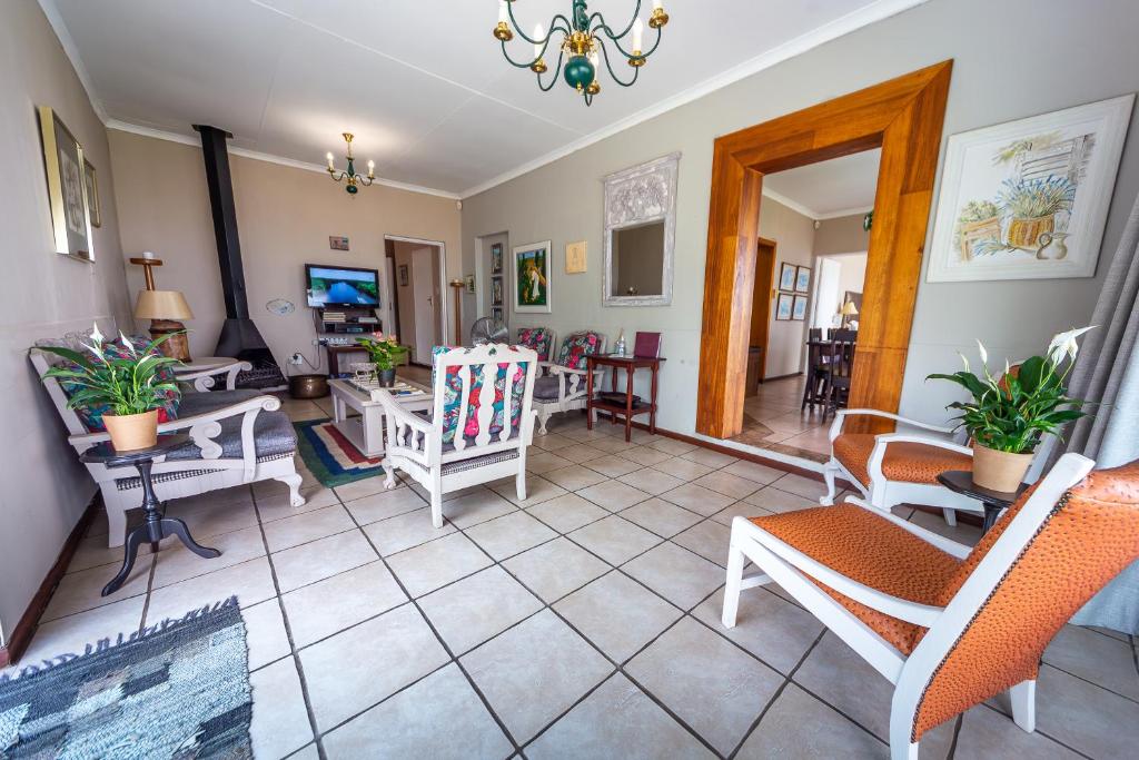 TV o dispositivi per l'intrattenimento presso Graceland Self-Catering Cottages