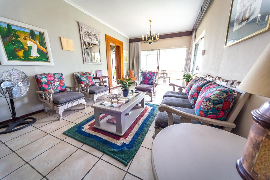 Area soggiorno di Graceland Self-Catering Cottages