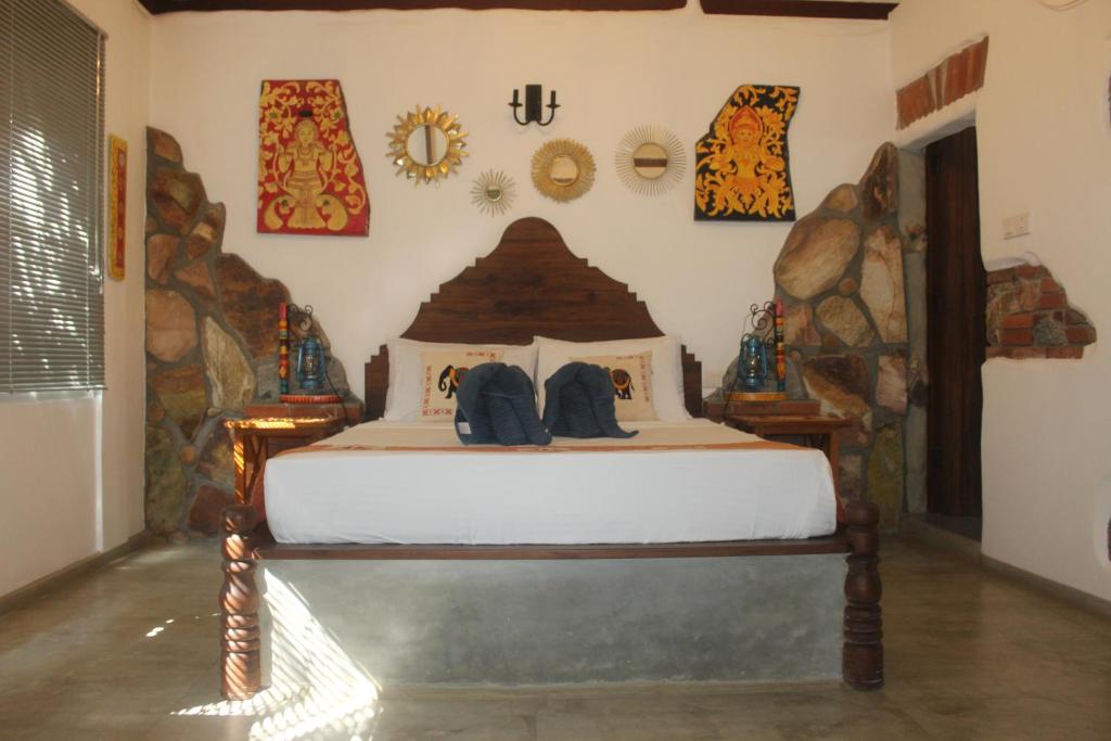 Postel nebo postele na pokoji v ubytování Villa Olde Ceylon