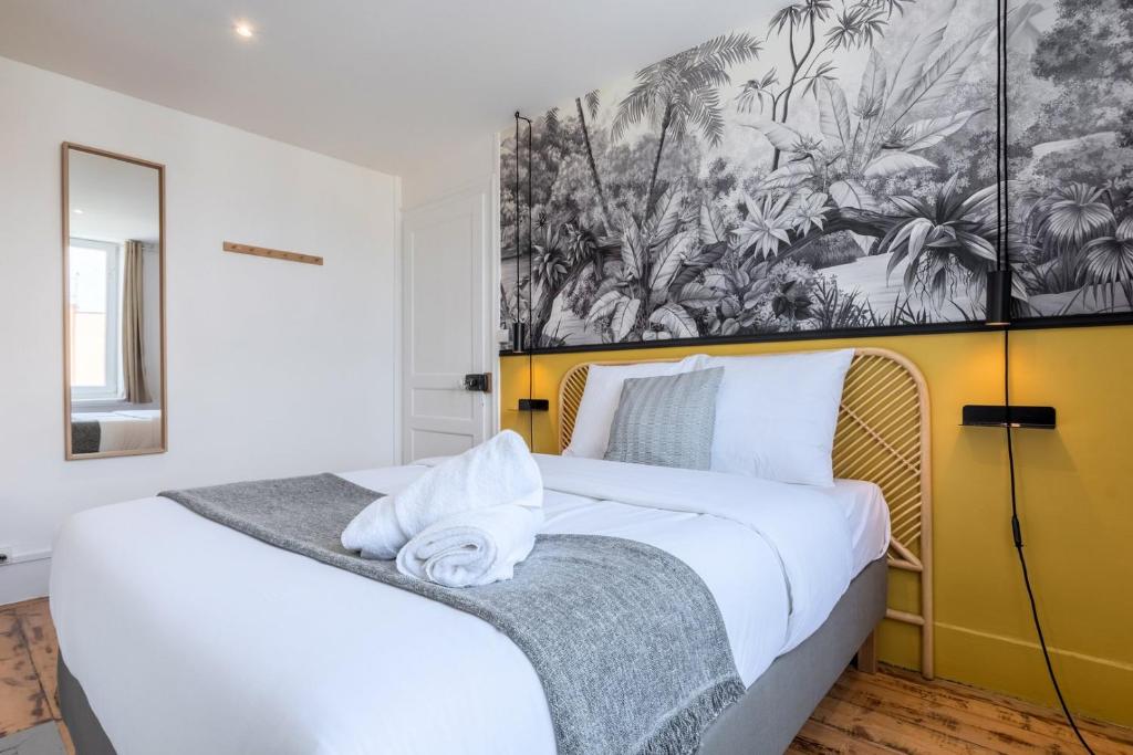 Posteľ alebo postele v izbe v ubytovaní Bright 3-bedroom 2-bathroom flat