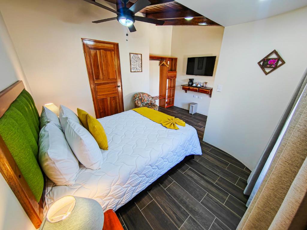 Postel nebo postele na pokoji v ubytování Sibu Boutique Hotel