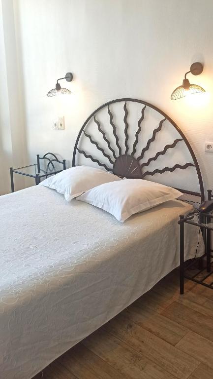 Postel nebo postele na pokoji v ubytování Au Nouvel Hôtel
