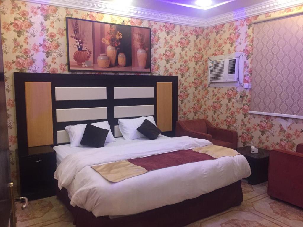 Voodi või voodid majutusasutuse Al Majaridah Hotel toas