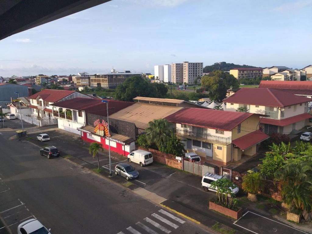 an aerial view of a city with buildings and a street at NANA A33 Appartement 2 Chambres Climatisées cuisine équipée Netflix in Cayenne
