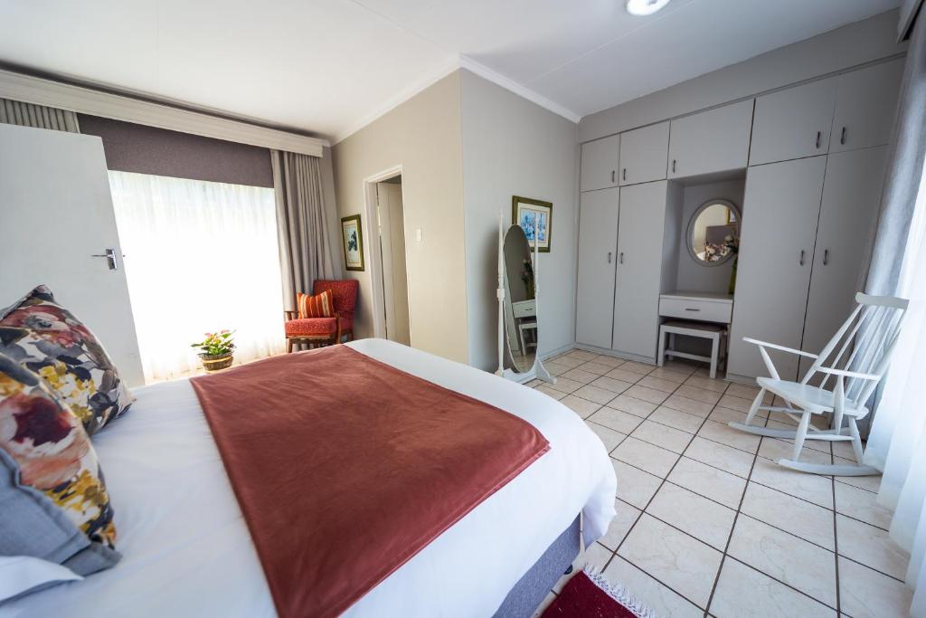 Letto o letti in una camera di Graceland Self-Catering Cottages