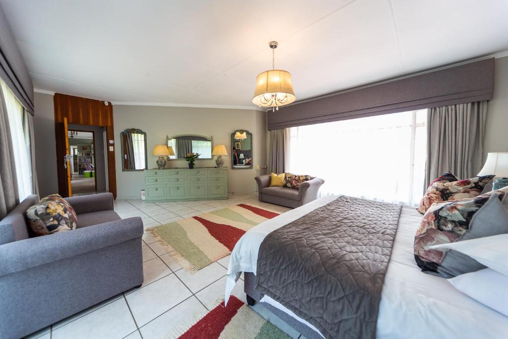 Letto o letti in una camera di Graceland Self-Catering Cottages